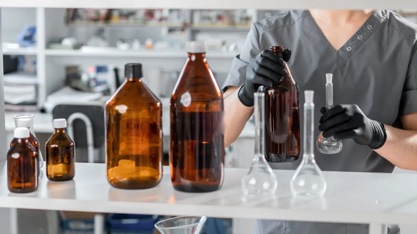 Lab shelf with various chemicals